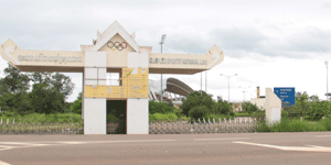 The National Stadium was developed on a conservation forest area and affected villagers occupied the area. 