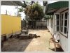 House in business area by the main road for sale
