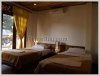 Traditional wooden houses hotel by the Mekong