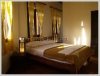 Traditional wooden houses hotel by the Mekong