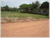 Empty land in diplomatic area near new concrete road