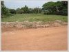 Empty land in diplomatic area near new concrete road