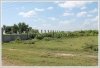 Land by Mekong with wall fence about 18km from city center