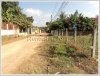 Vacant land by a road in fast developing area