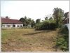 Vacant land by a road in fast developing area