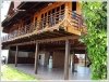 Wooden Lao style house by the Mekong