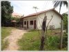 House with large yard by main road for sale