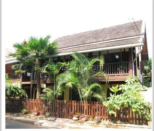 ID: 1638 New Lao classic house by Namkan River and frontage next to pave road in city of Luangprabang