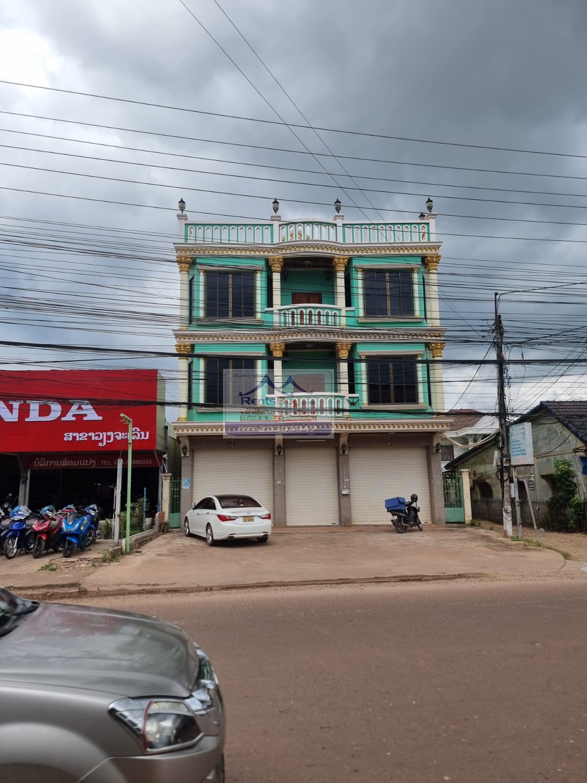 5971 – The exquisite 3-story shophouse is for sale, situated near the iconic That-Luang Golden Stupa.