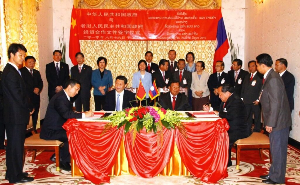  Laos and China sign the Memorandum of Understanding on Vientiane Comprehensive Development Project in June 2010, witnessed by then Chinese Vice President Xi Jinping and his then Lao counterpart Bounnhang Vorachit. /Photo by Lao-China Joint Venture Investment