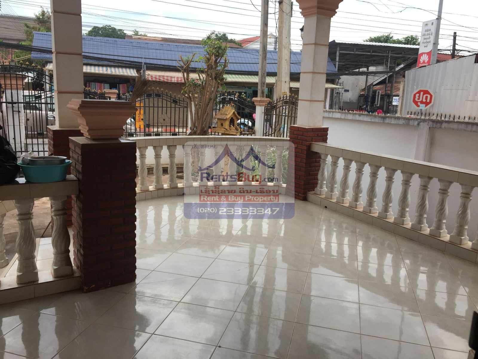 6024 – The Charming 2-Story House for Rent. Nestled Patouxay Monument, Thatluang Golden Stupa and ITECC Shopping Mall.