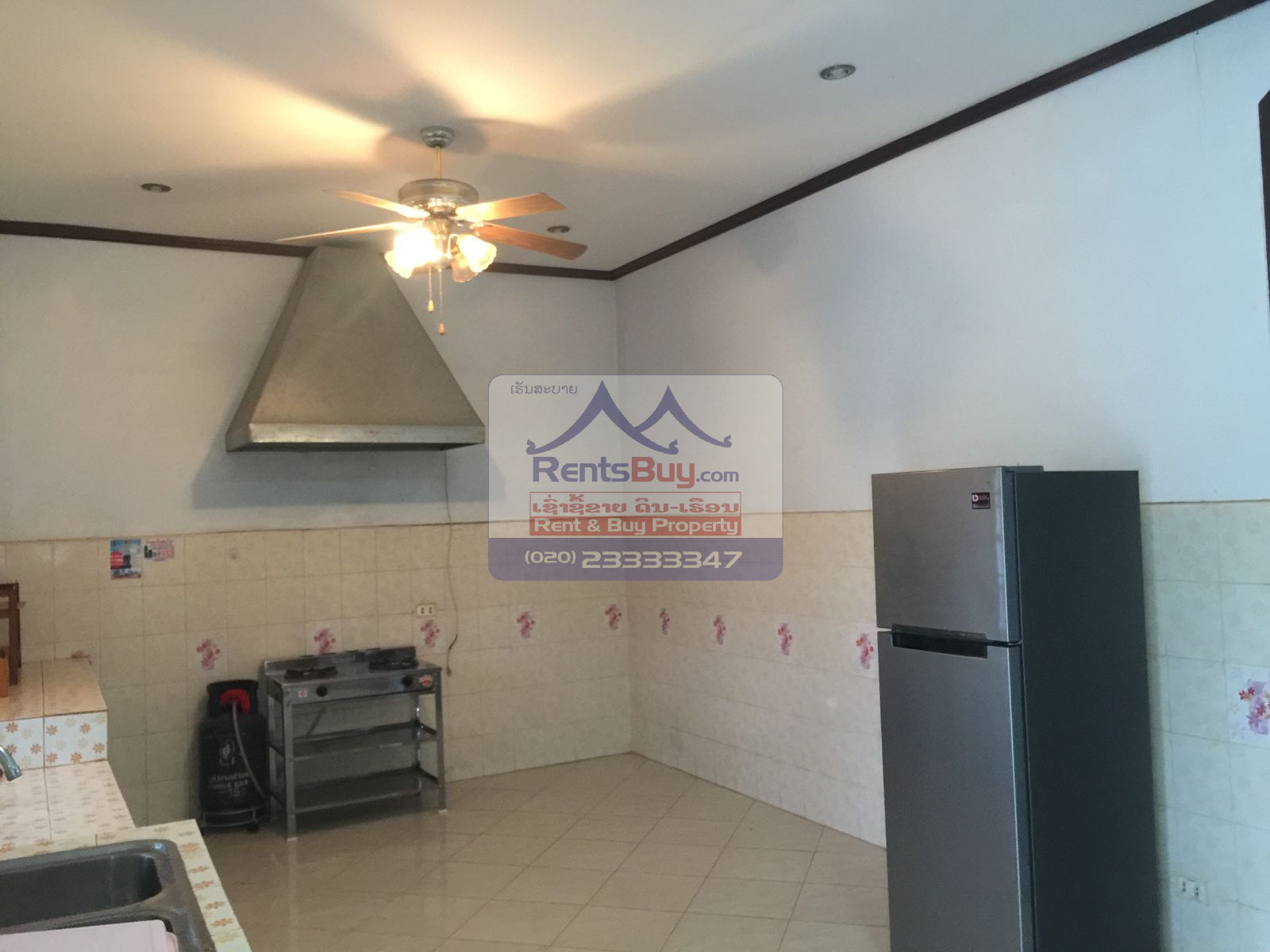 6024 – The Charming 2-Story House for Rent. Nestled Patouxay Monument, Thatluang Golden Stupa and ITECC Shopping Mall.