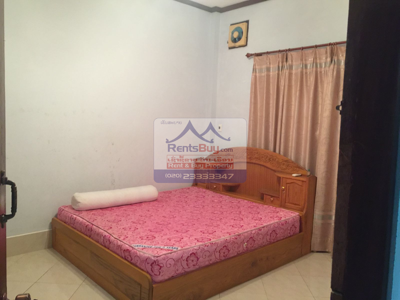 6024 – The Charming 2-Story House for Rent. Nestled Patouxay Monument, Thatluang Golden Stupa and ITECC Shopping Mall.