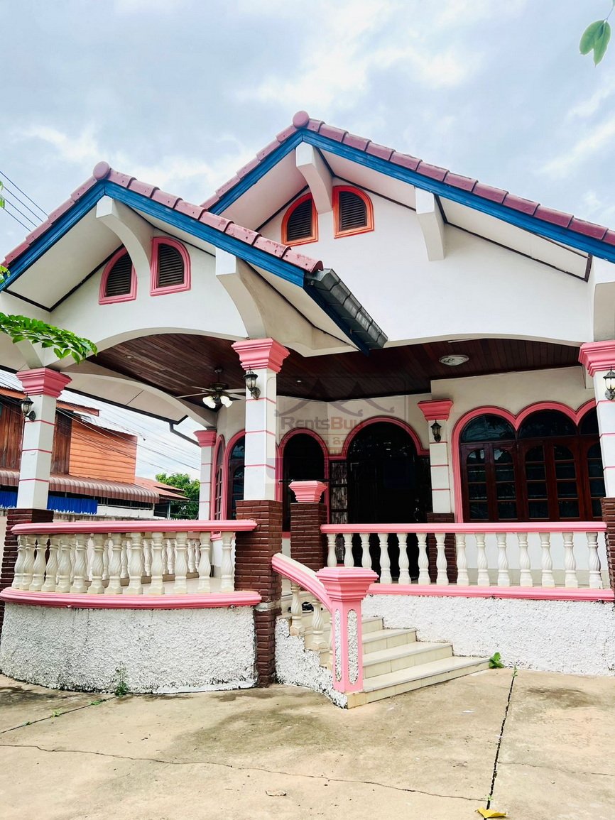 6024 – The Charming 2-Story House for Rent. Nestled Patouxay Monument, Thatluang Golden Stupa and ITECC Shopping Mall.