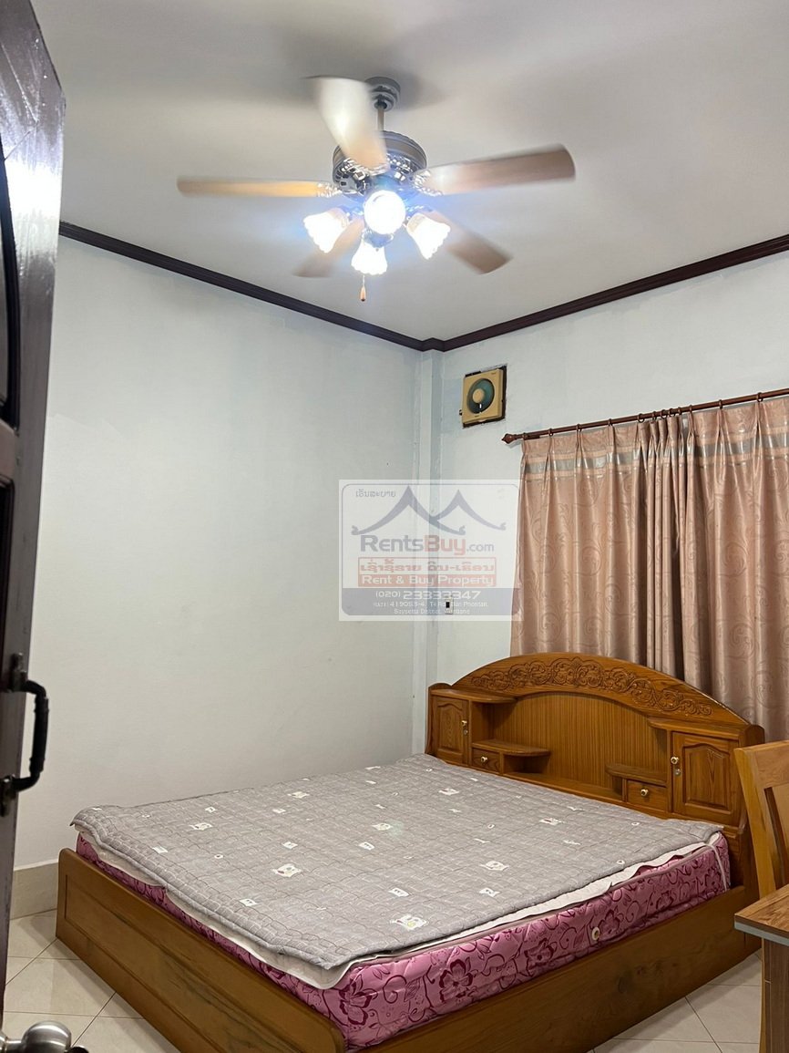 6024 – The Charming 2-Story House for Rent. Nestled Patouxay Monument, Thatluang Golden Stupa and ITECC Shopping Mall.
