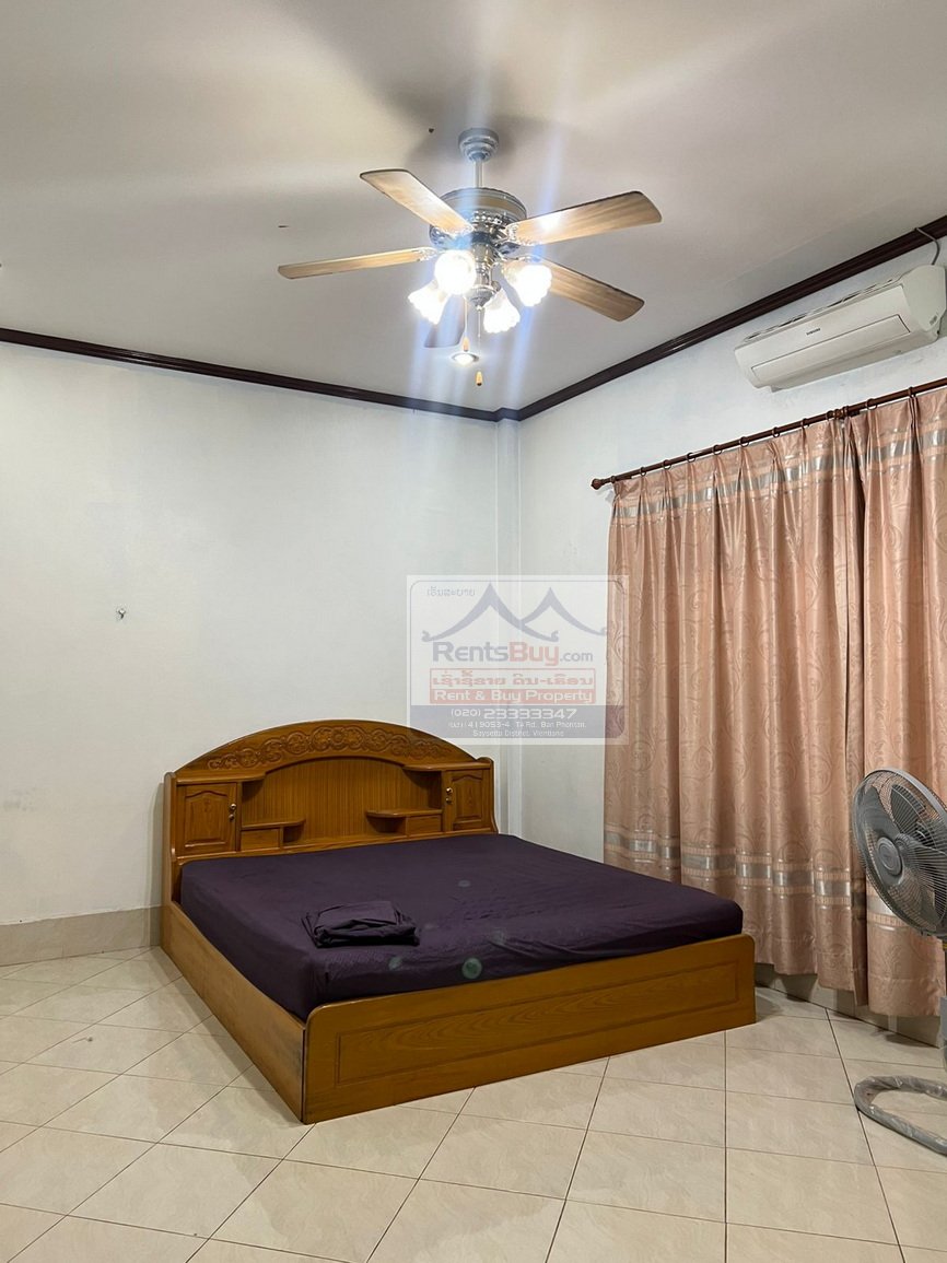 6024 – The Charming 2-Story House for Rent. Nestled Patouxay Monument, Thatluang Golden Stupa and ITECC Shopping Mall.