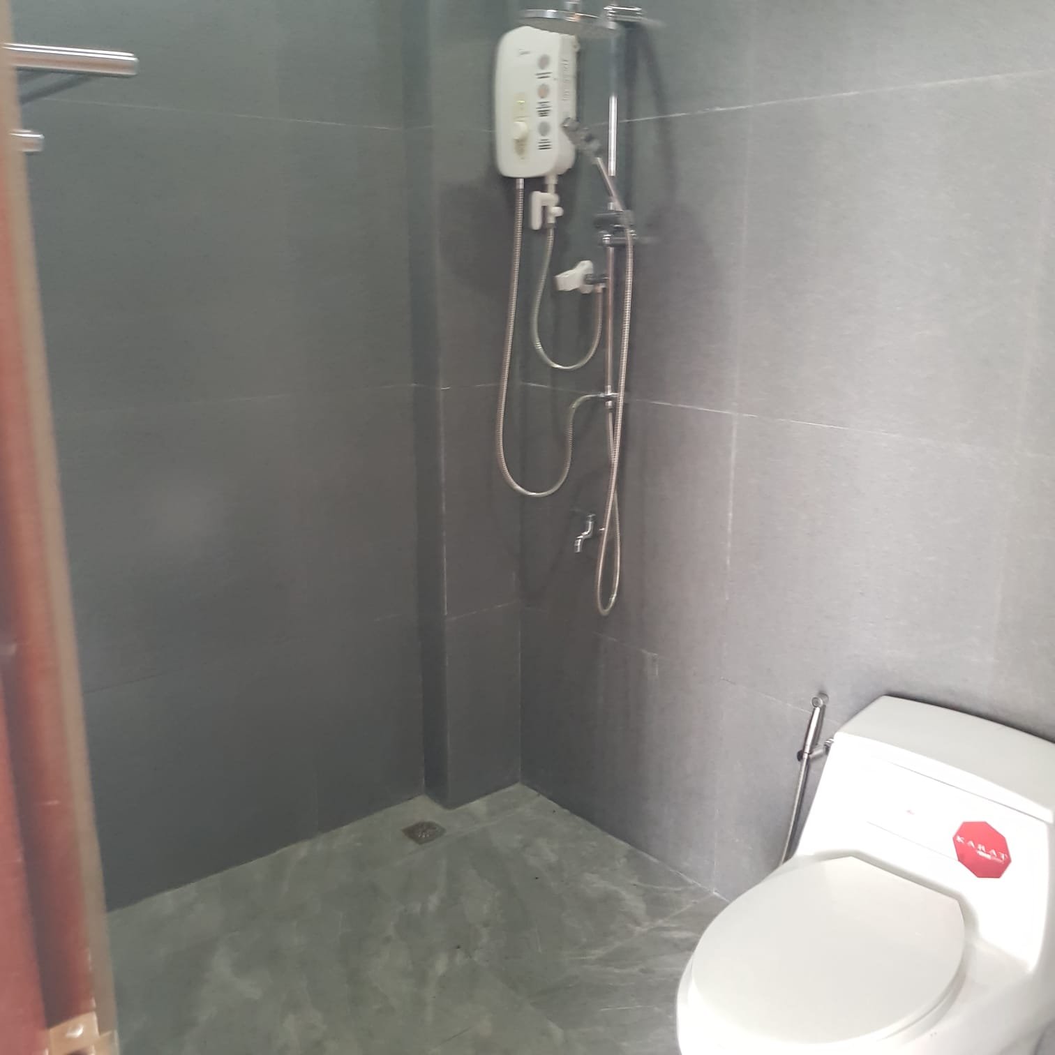 WhatsApp Image 2025-03-17 at 15.08.26_649eaad3 6064-A convenient location close to amenities, or a vibrant Lao community atmosphere of the stunning 3-storey house near Thatluang Stupa