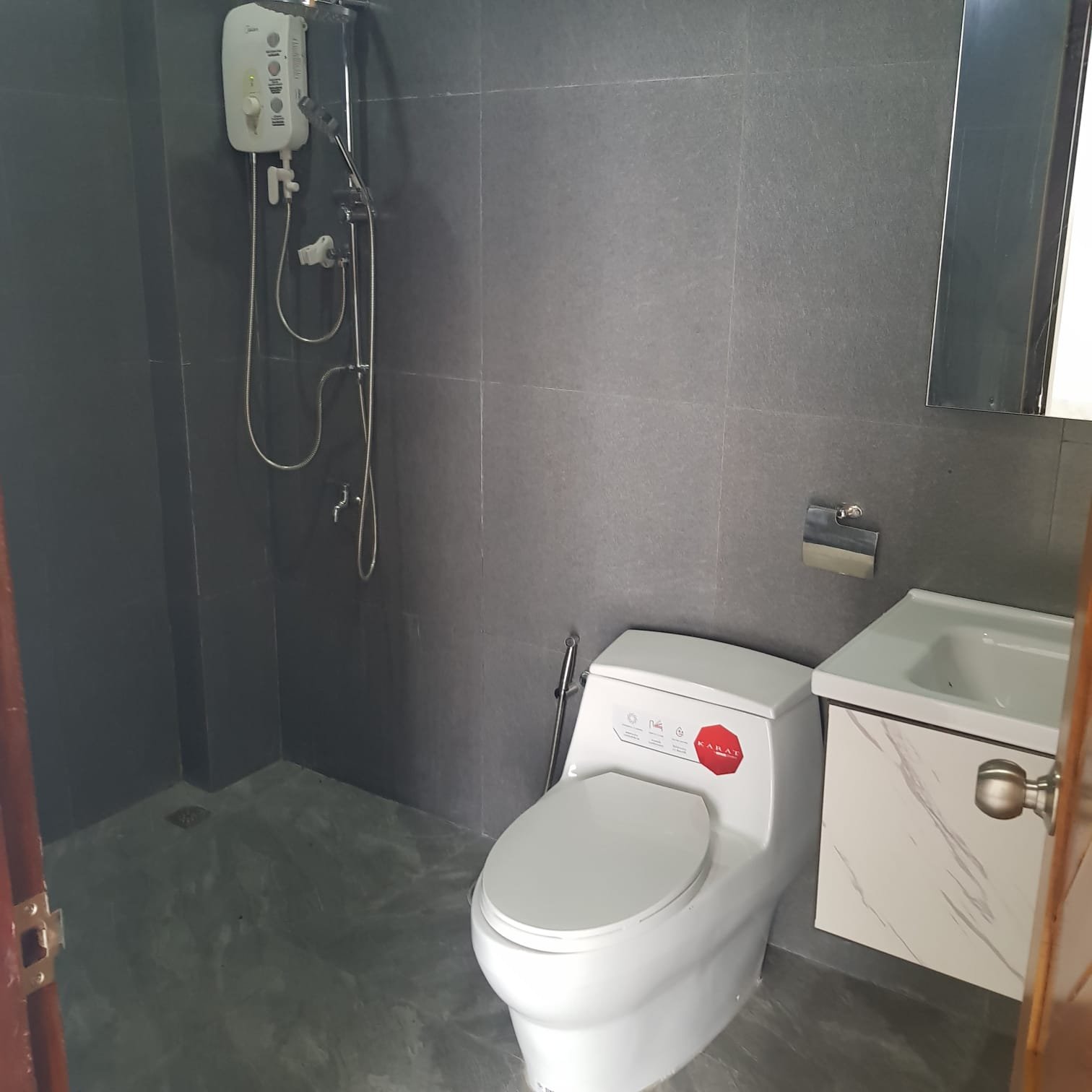 WhatsApp Image 2025-03-17 at 15.08.26_ffb166f5 6064-A convenient location close to amenities, or a vibrant Lao community atmosphere of the stunning 3-storey house near Thatluang Stupa