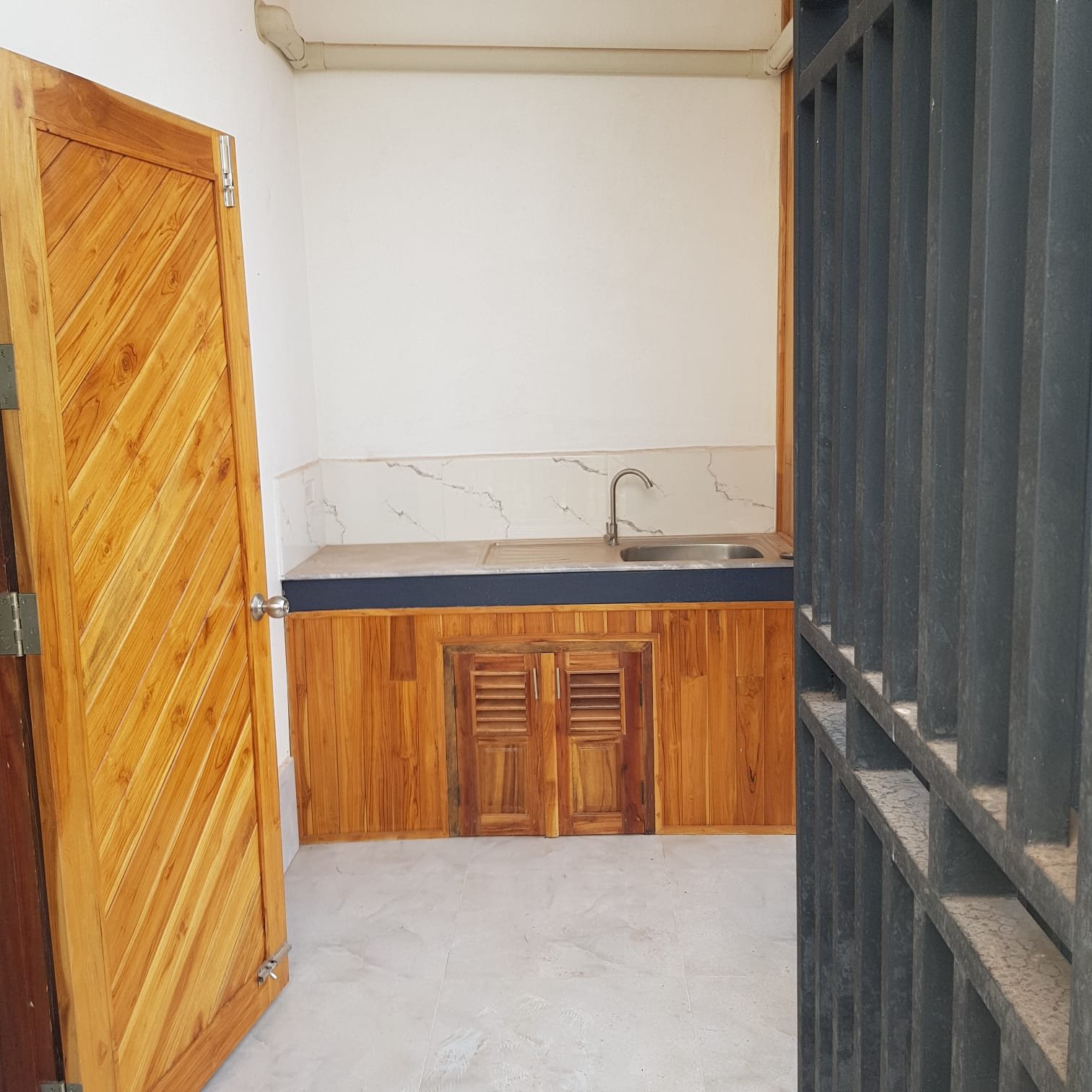 WhatsApp Image 2025-03-17 at 15.08.28_4423363a 6064-A convenient location close to amenities, or a vibrant Lao community atmosphere of the stunning 3-storey house near Thatluang Stupa