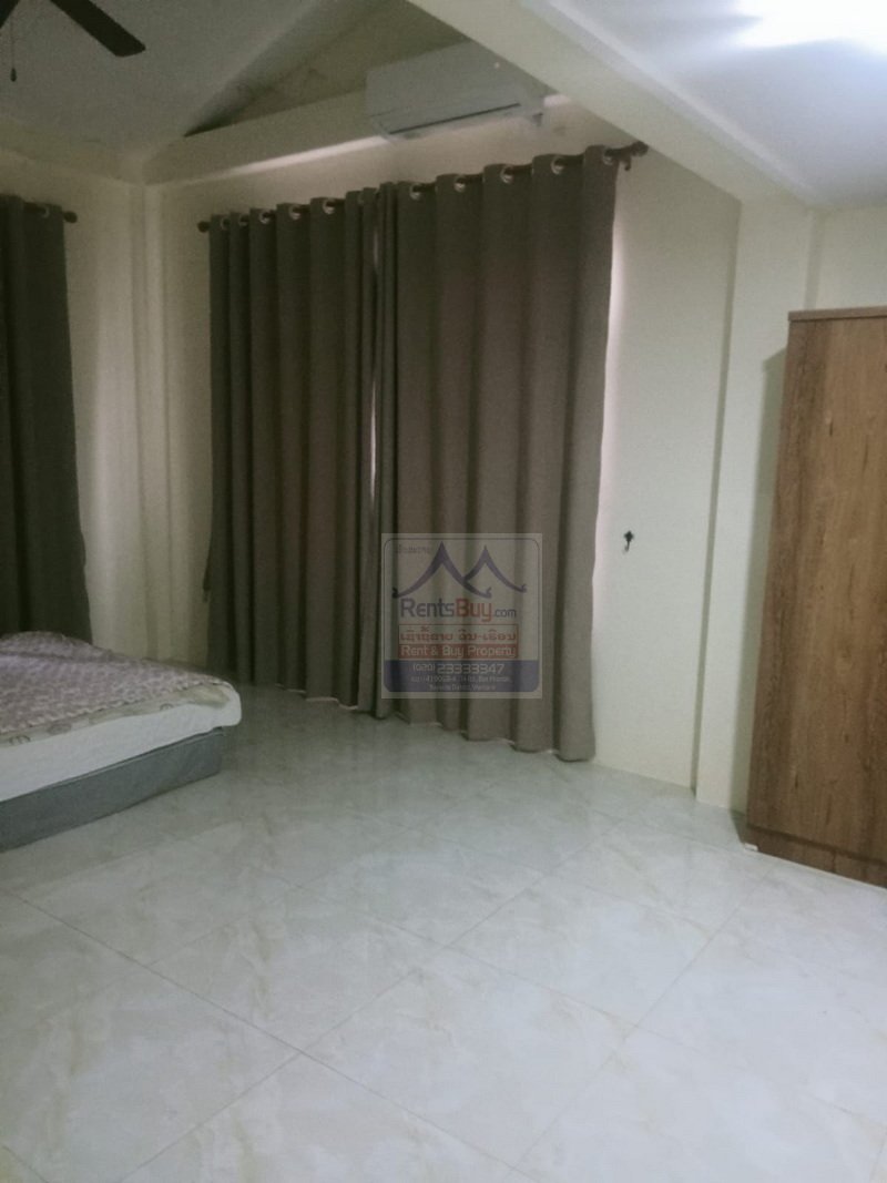 Houserent05 6497-Your Vientiane Dream Home for Rent: Spacious & Furnished in Vibrant Nongduang Market Zone.