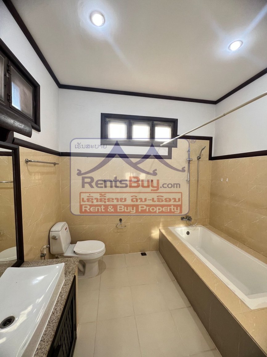 6618-Charming Lao-Style Villa for Lease in Central Vientiane – Spacious, Secure, Fully Furnished