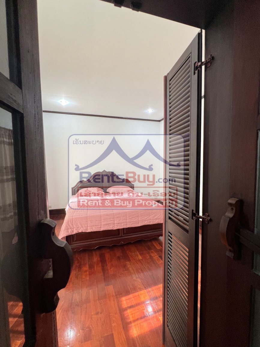 6618-Charming Lao-Style Villa for Lease in Central Vientiane – Spacious, Secure, Fully Furnished