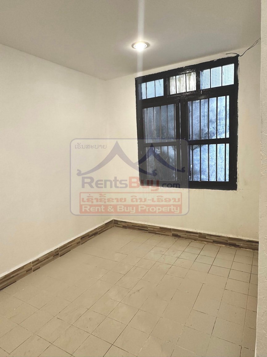 buildingforrent02 6743-Sisattanak District: Fully Furnished, Versatile Flat in Prime Expat Community