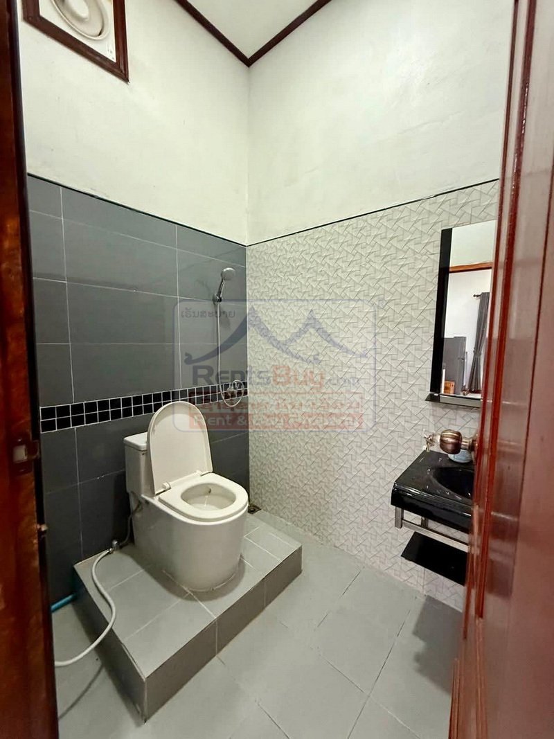 houseforrent01 7003-Spacious 4BR/5BA Modern Family House for Rent in Sisattanak – Fully Furnished with Parking & Garden