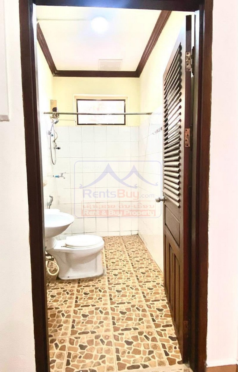 houseforrent08 7103-6-Bedroom House for Rent Near ITECC Mall, Vientiane Capital – Spacious Main-Road Property with 2 Living Rooms, 2 Kitchens, Large Parking Area